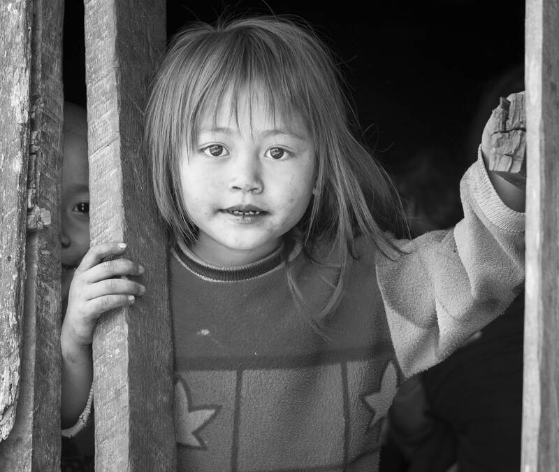 Dans un village Akha, à la frontière chinoise