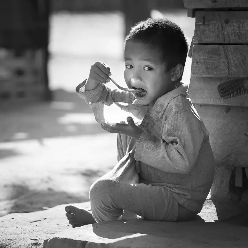 Dans un village Akha, à la frontière chinoise